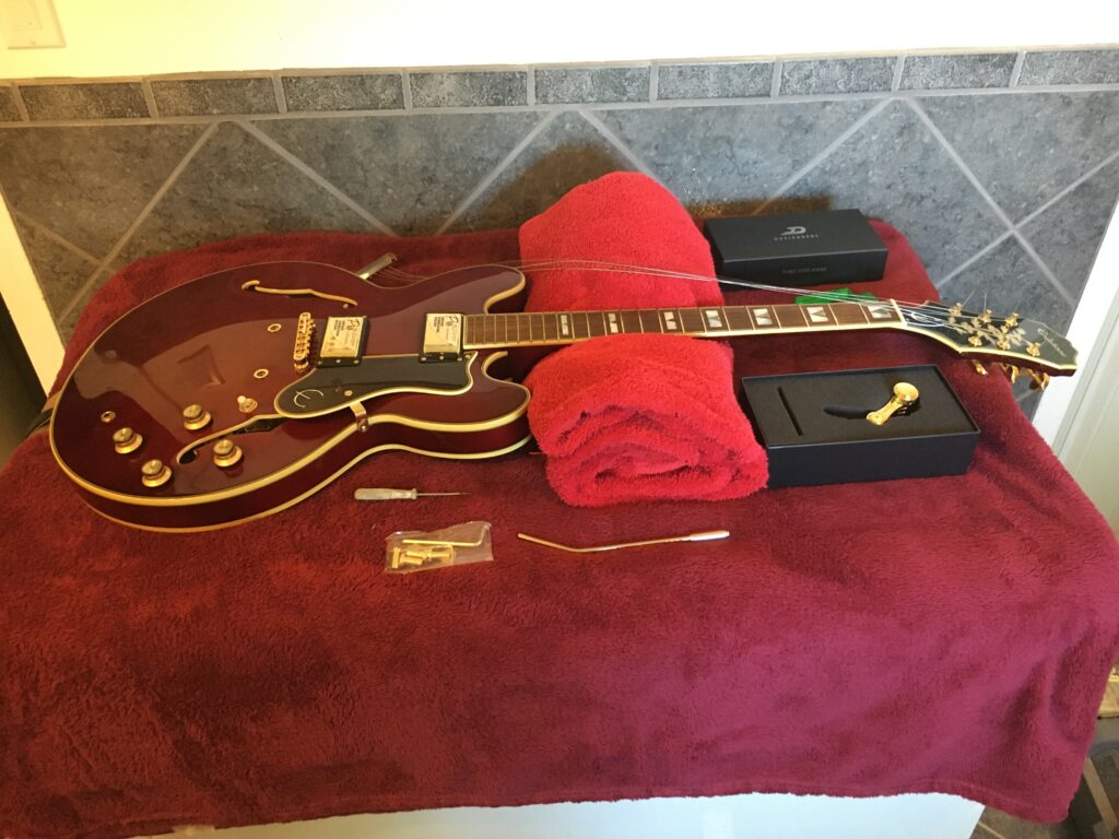 The Epiphone Sheraton II Pro with its tailpiece removed