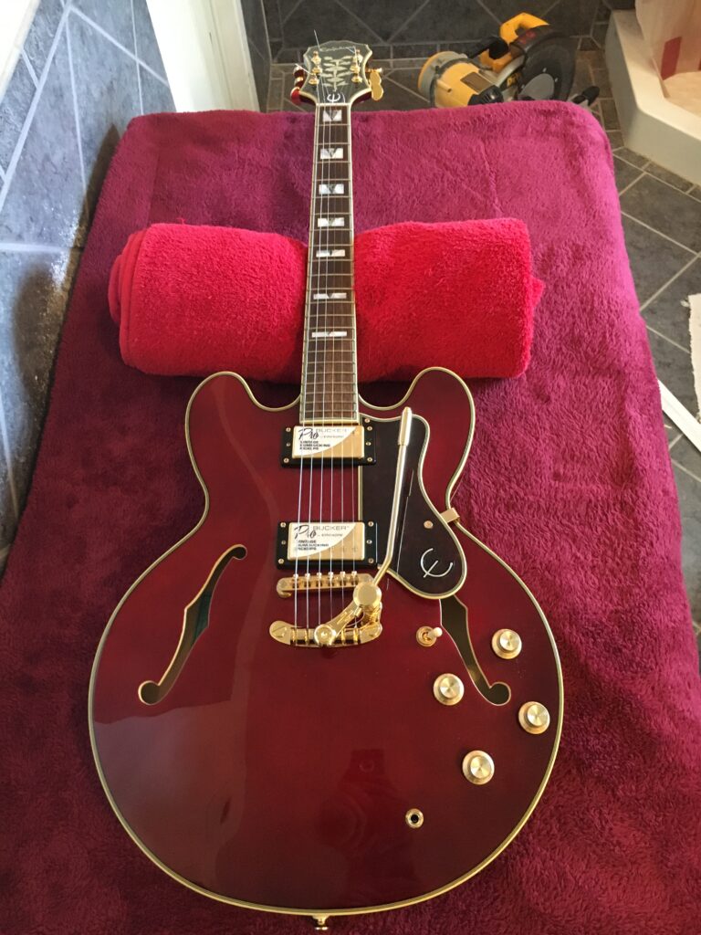 Top view of the guitar and Les Trem such that the correct arm installation is clearly visible