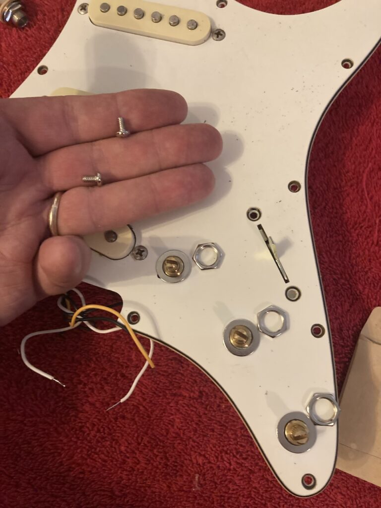 New assembly in place and retaining nuts and mounting screws prior to fastening
