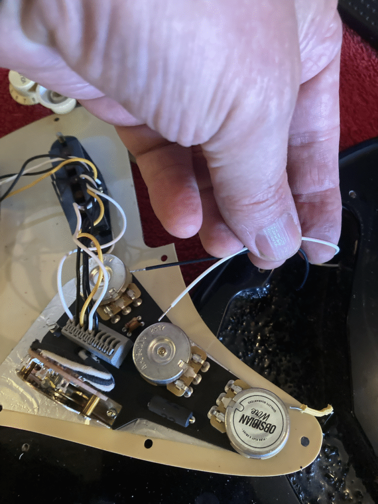 Several wires connected and the output jack hot wire about to be